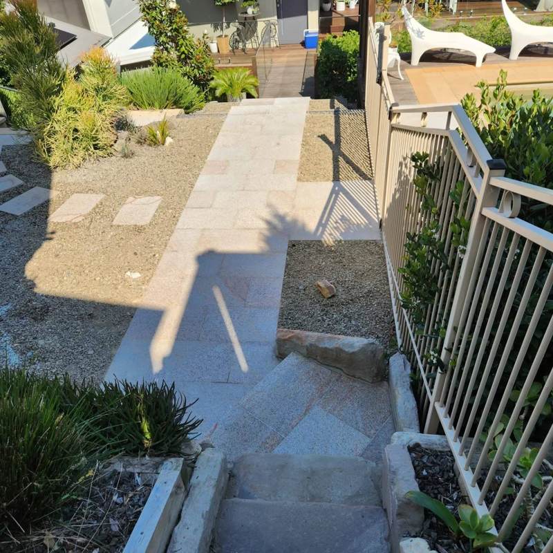 Garden pathway with stepping stones and native planting